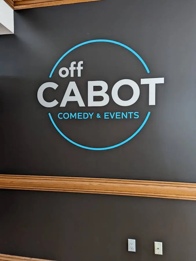 Completed dimensional business logo installed on an interior wall